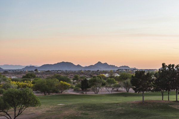 Garden and pathway view at GlenEagles Apartments: Luxury outdoor space in a tranquil setting