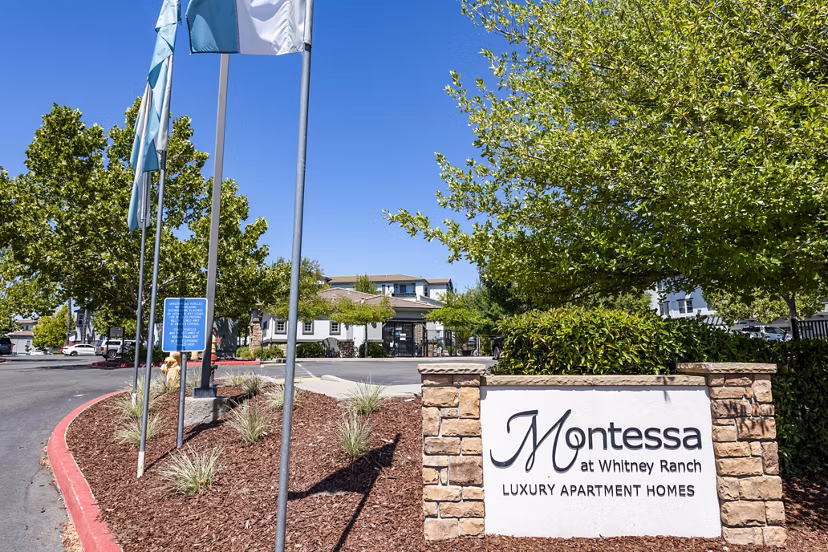 Montessa at Whitney Ranch Apartments signage in a landscaped setting, luxury living in Henderson