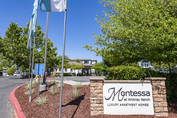 Montessa at Whitney Ranch Apartments signage in a landscaped setting, luxury living in Henderson