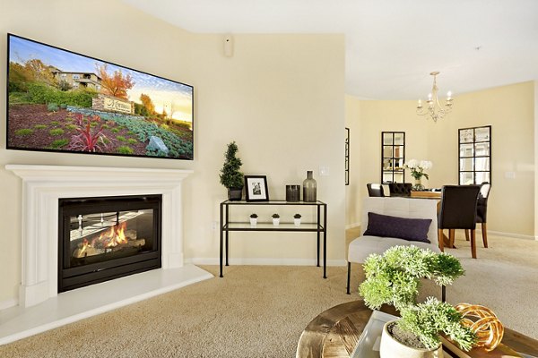 Spacious living room with modern decor in Montessa At Whitney Ranch Apartments