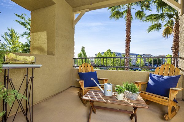 Spacious patio with stylish seating at Montessa At Whitney Ranch Apartments, ideal for relaxation and outdoor dining