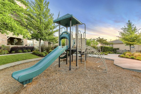 Recreational area with lush green spaces at Montessa At Whitney Ranch Apartments