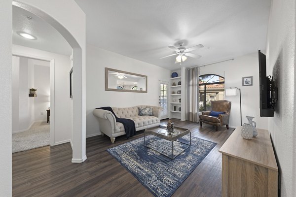 Spacious living room with modern decor and natural light in San Cierra Apartments