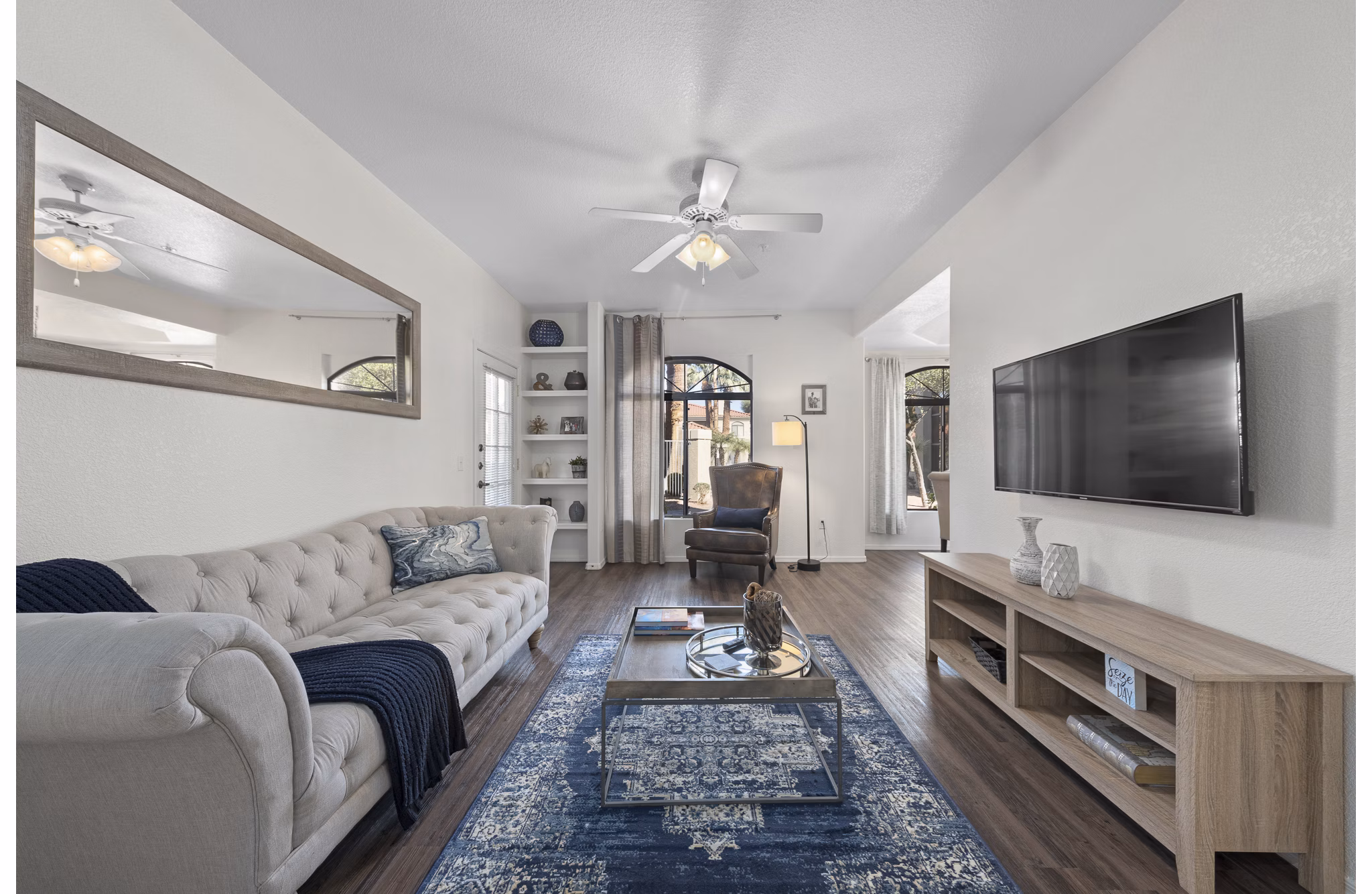 Spacious living room with modern decor in San Cierra Apartments, providing luxury living by Greystar
