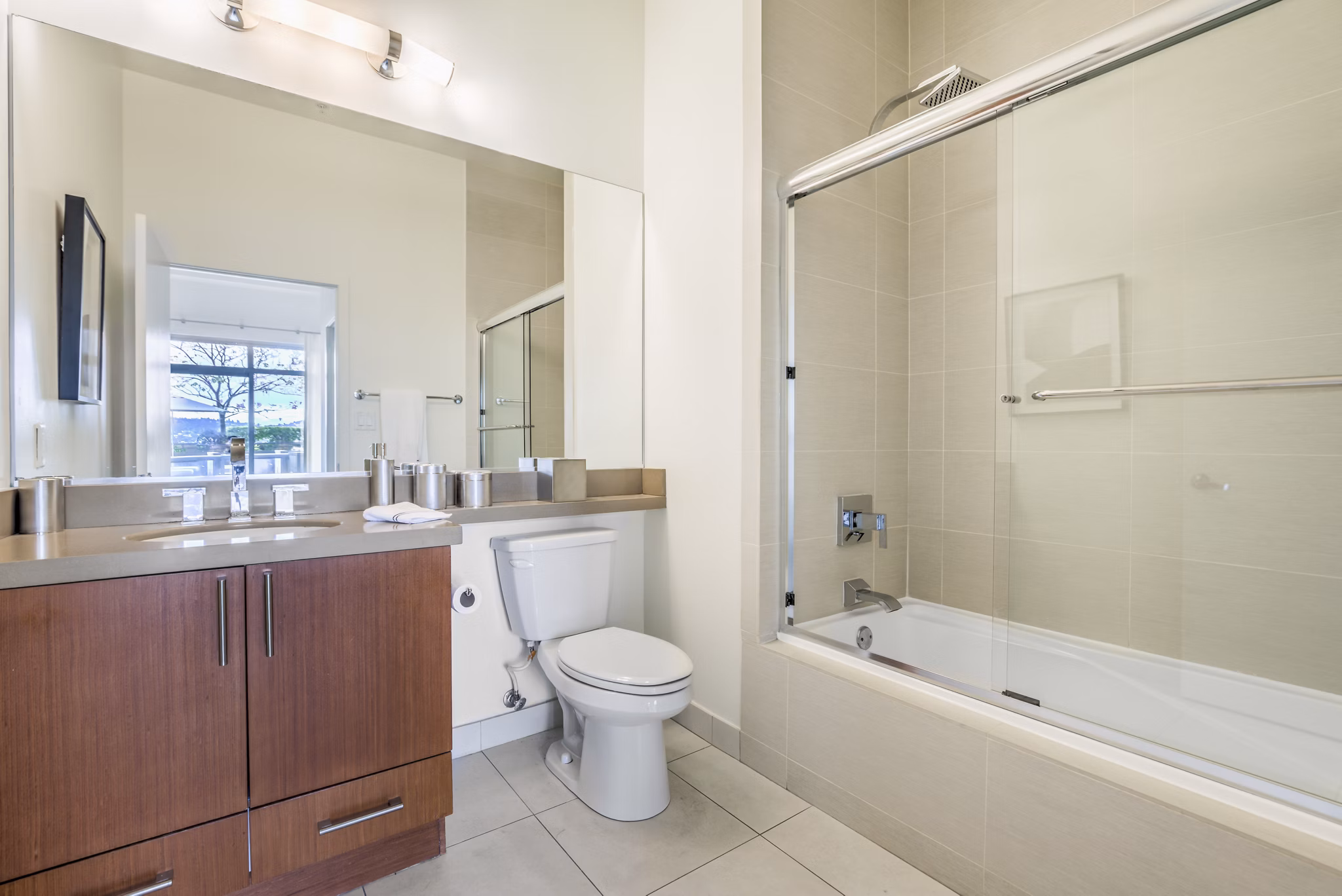 Elegant bathroom featuring a modern vanity and sleek fixtures at NoHo 14 Apartments in North Hollywood
