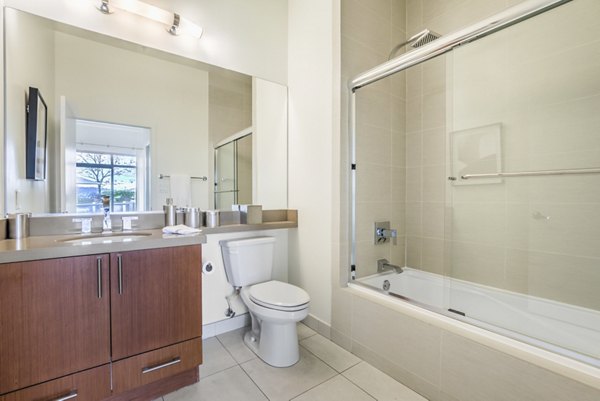 Elegant bathroom featuring a modern vanity and sleek fixtures at NoHo 14 Apartments in North Hollywood