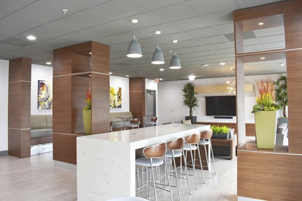 Modern clubhouse featuring stylish seating and entertainment area at NoHo 14 Apartments, a luxury Greystar community in North Hollywood