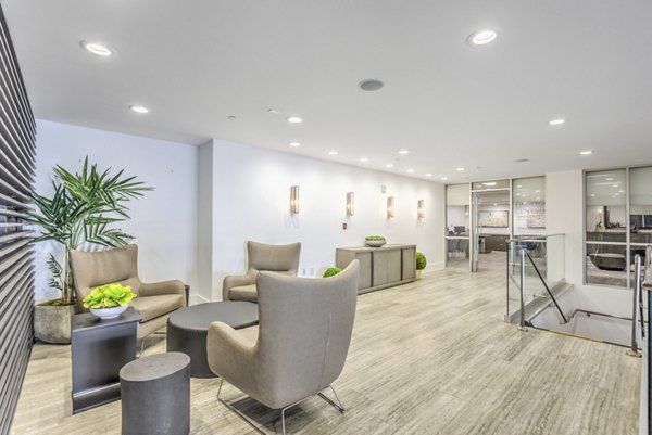 Clubhouse with modern design elements at NoHo 14 Apartments featuring luxury amenities for residents