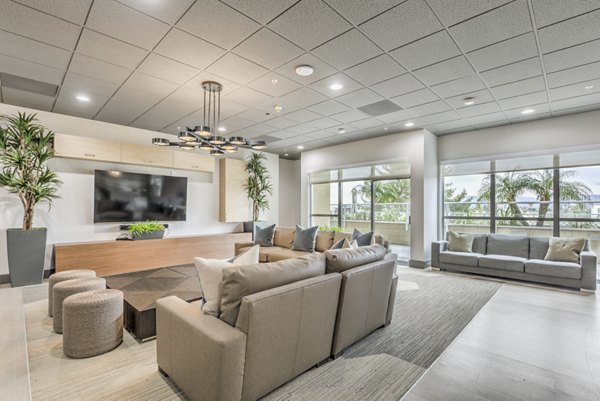Clubhouse with modern decor and seating at NoHo 14 Apartments, a Greystar luxury community in vibrant downtown Los Angeles
