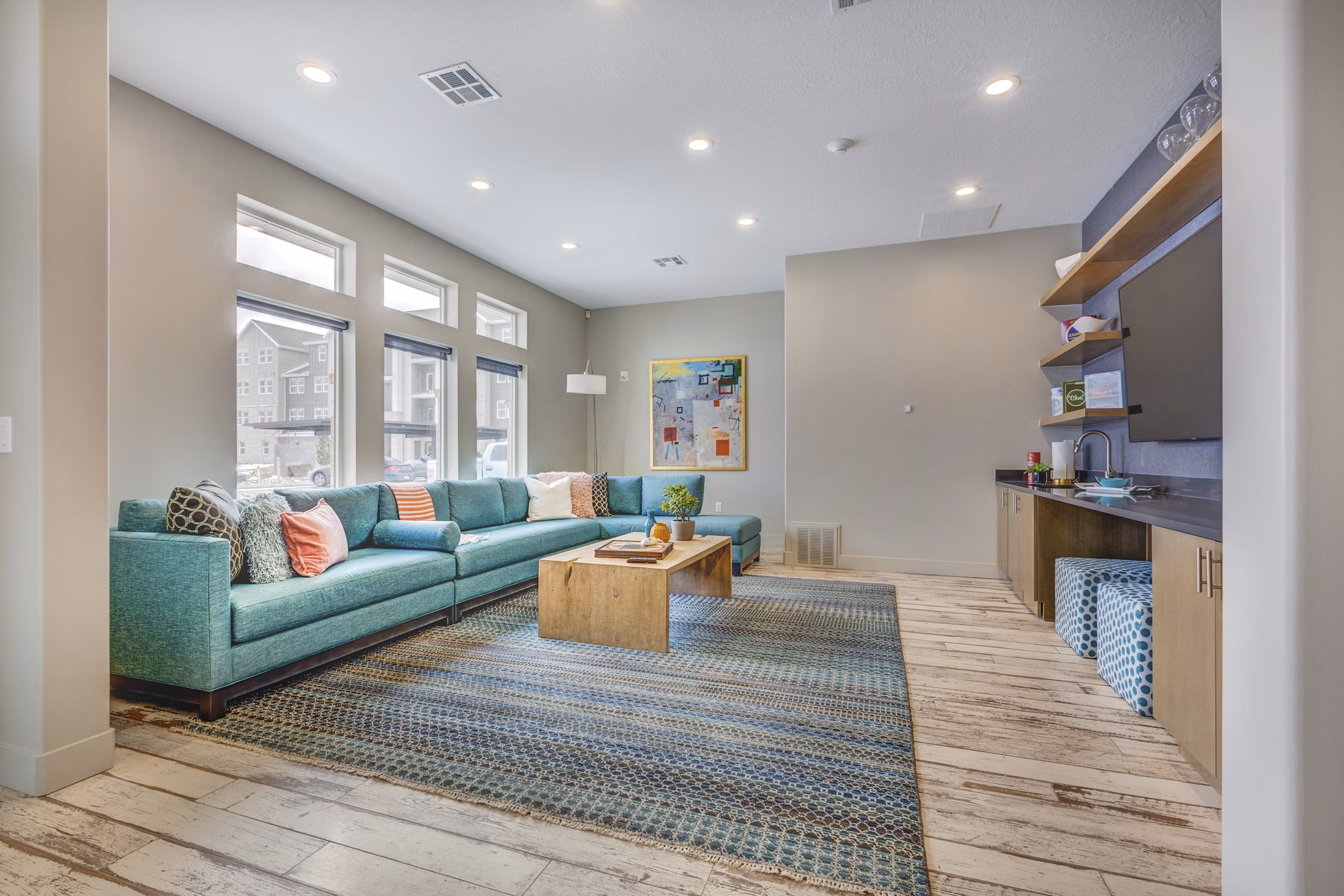 Clubhouse featuring modern design and entertainment spaces at Bria Apartments