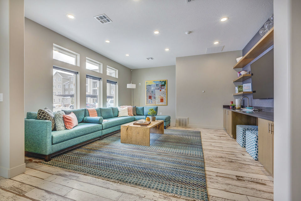 Clubhouse featuring modern design and entertainment spaces at Bria Apartments