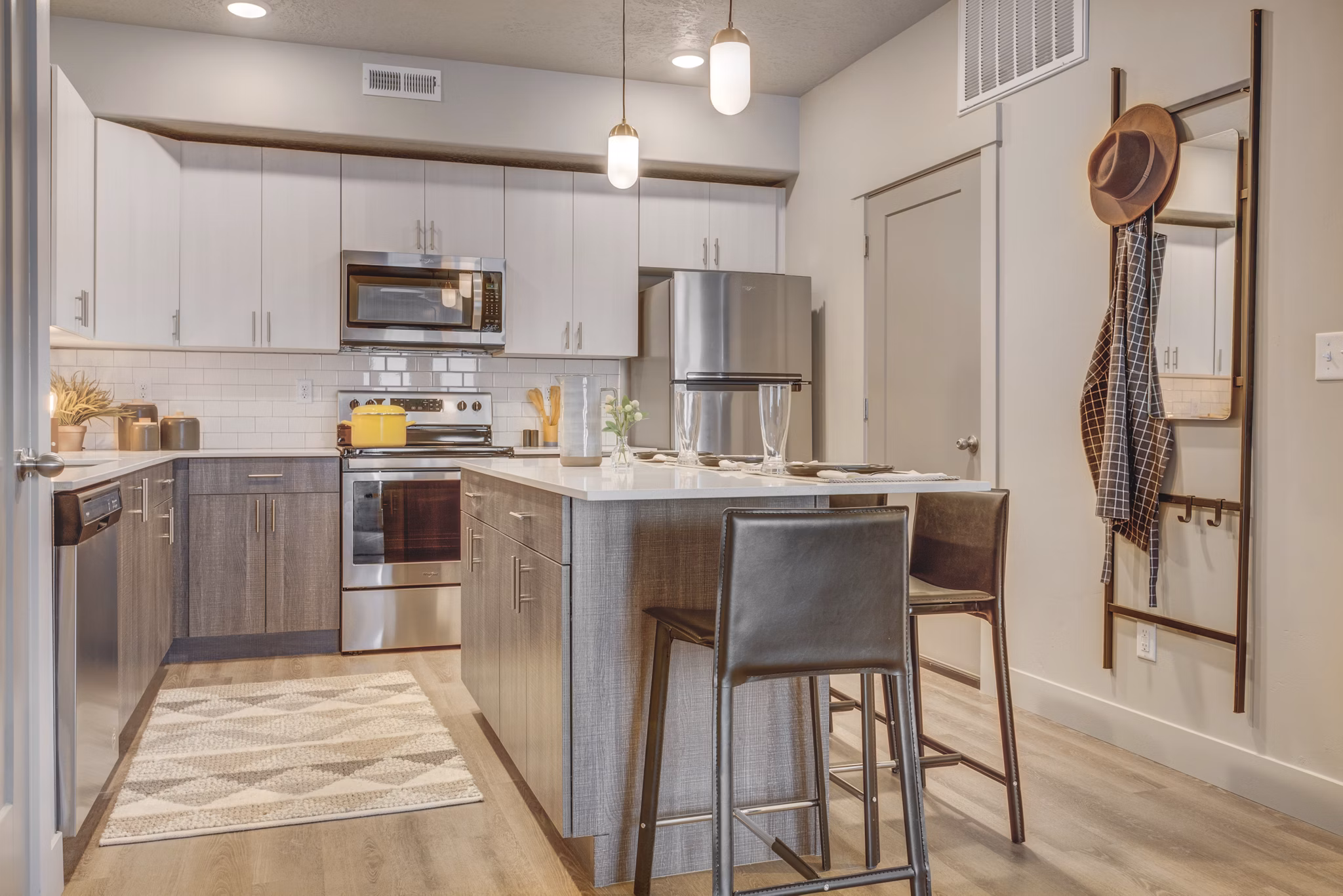 Sleek kitchen with modern stainless steel appliances at Bria Apartments, offering luxury living in an elegant setting