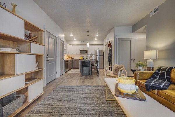 Spacious living room with elegant furnishings at Bria Apartments