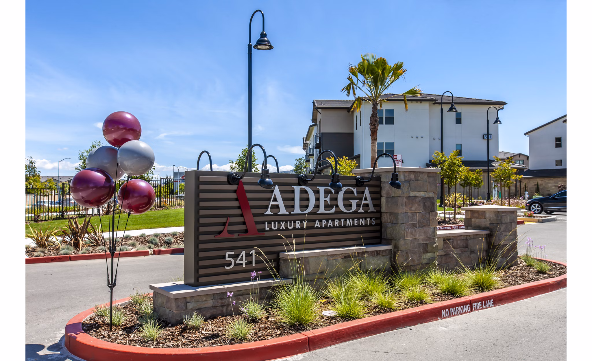 Adega Apartments: Elegant signage highlighting luxury living in downtown Bethesda