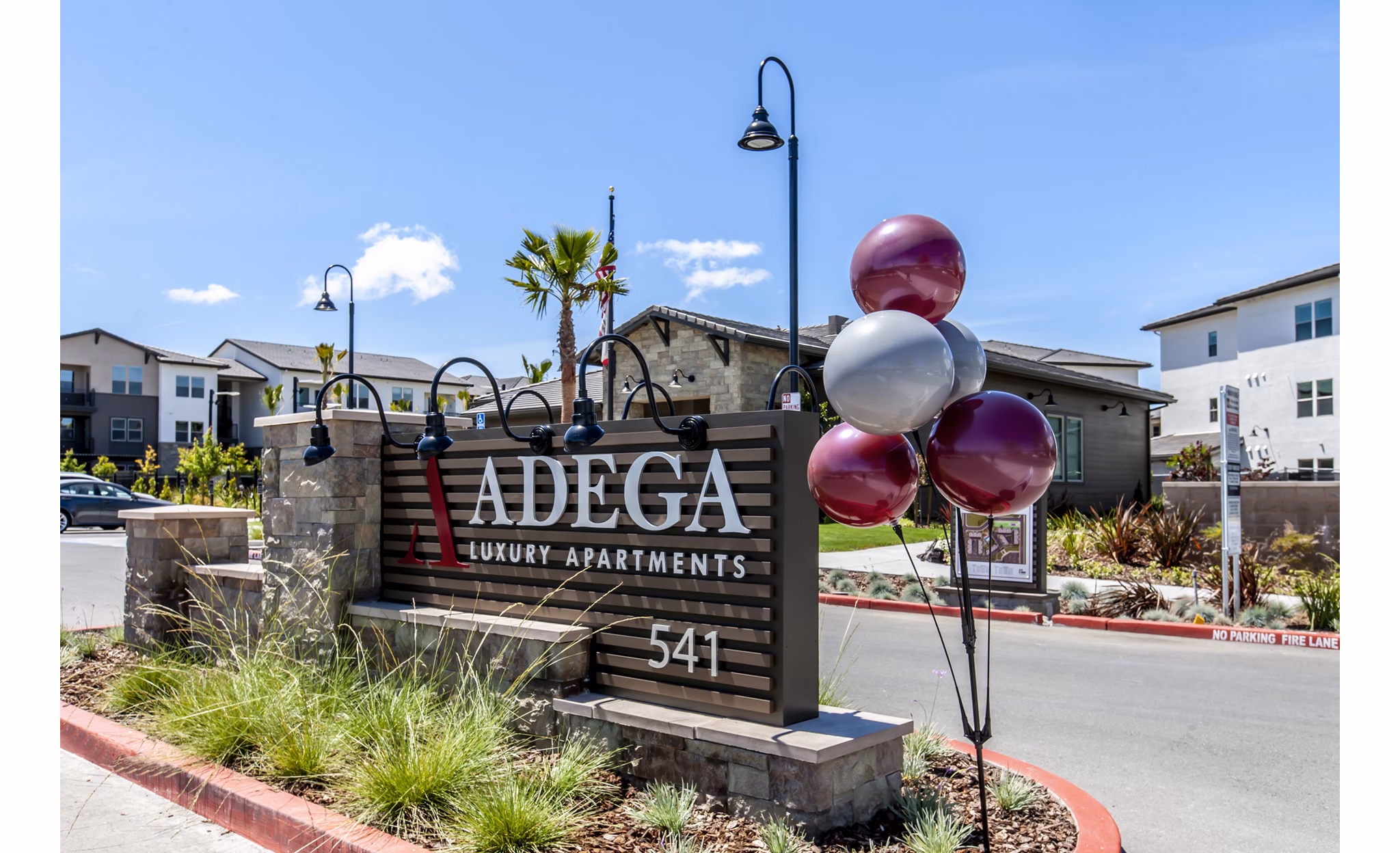Adega Apartments: Modern signage at luxury apartments in downtown Silver Spring, enhancing the community's upscale experience
