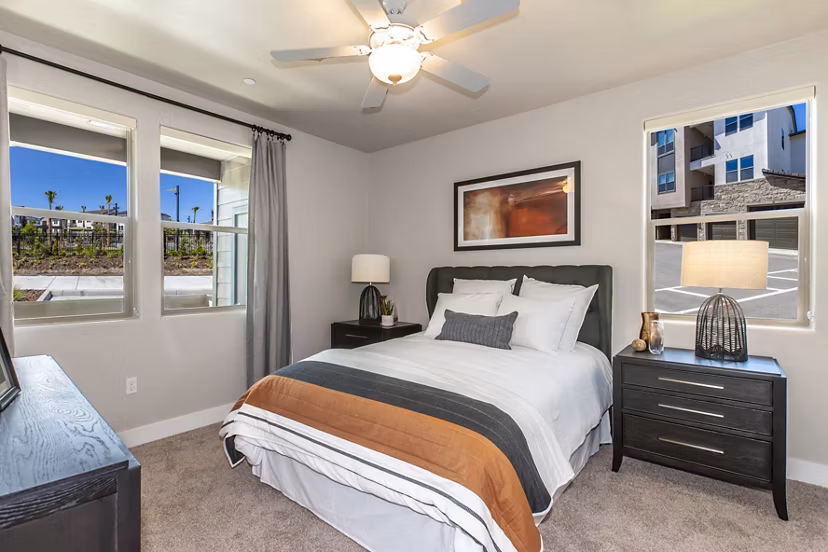 Cozy bedroom with modern design in Adega Apartments, San Francisco
