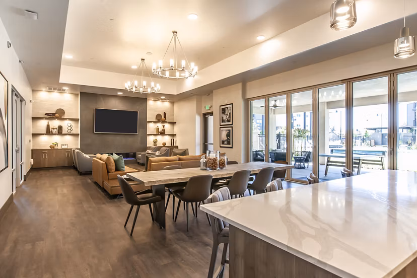 Elegant clubhouse with modern design at Adega Apartments, offering luxurious amenities for residents to enjoy social gatherings and events