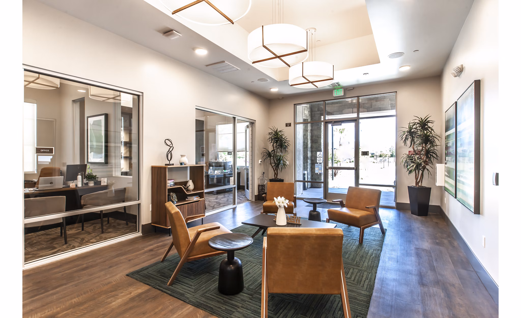Clubhouse featuring modern design and cozy seating at Adega Apartments