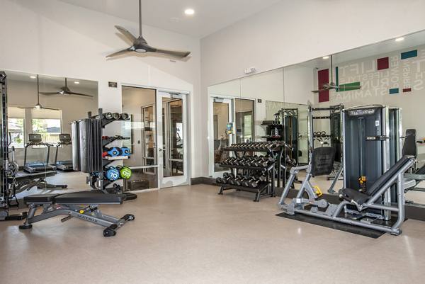fitness center at Adega Apartments
