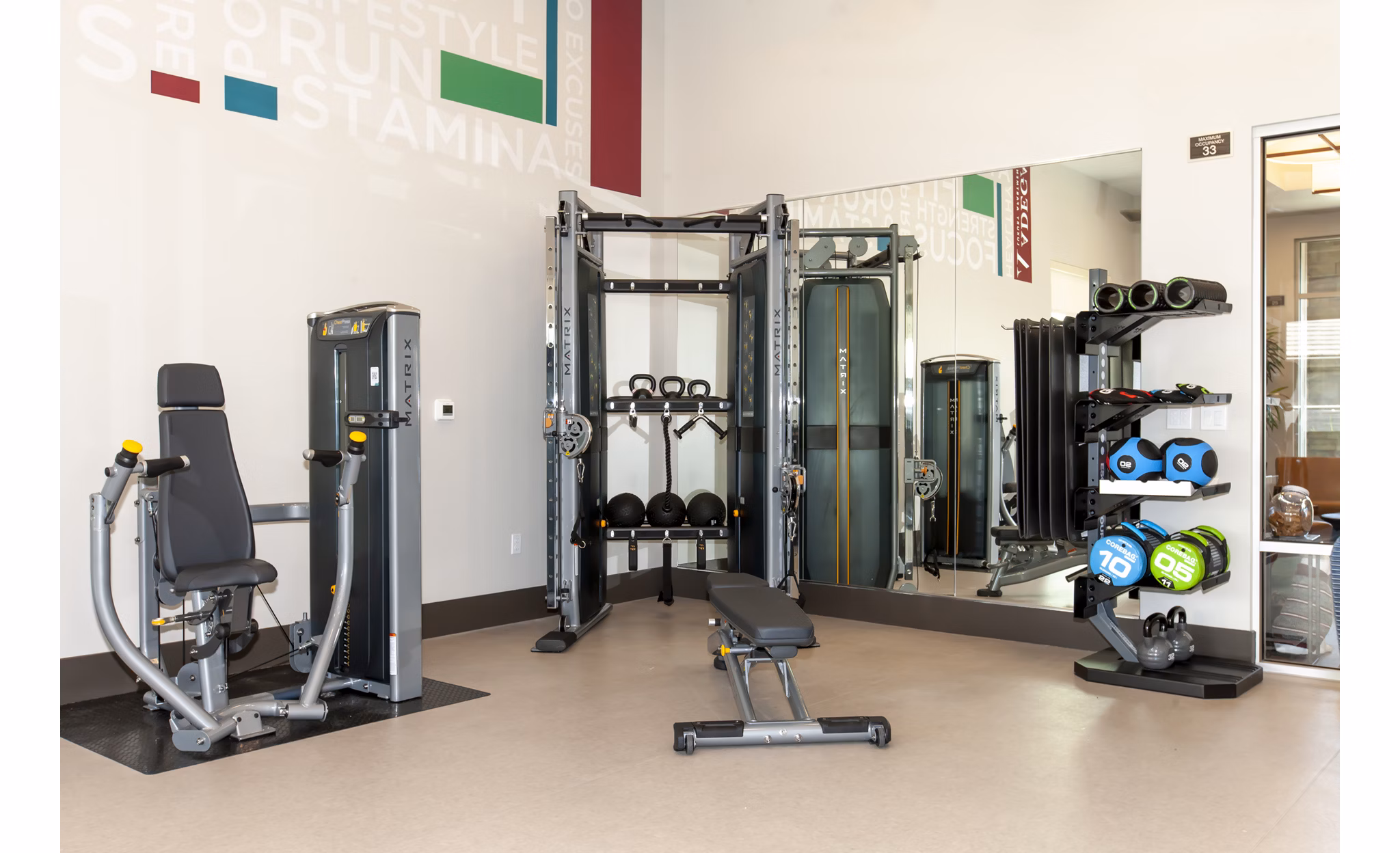 State-of-the-art fitness center with modern equipment at Adega Apartments