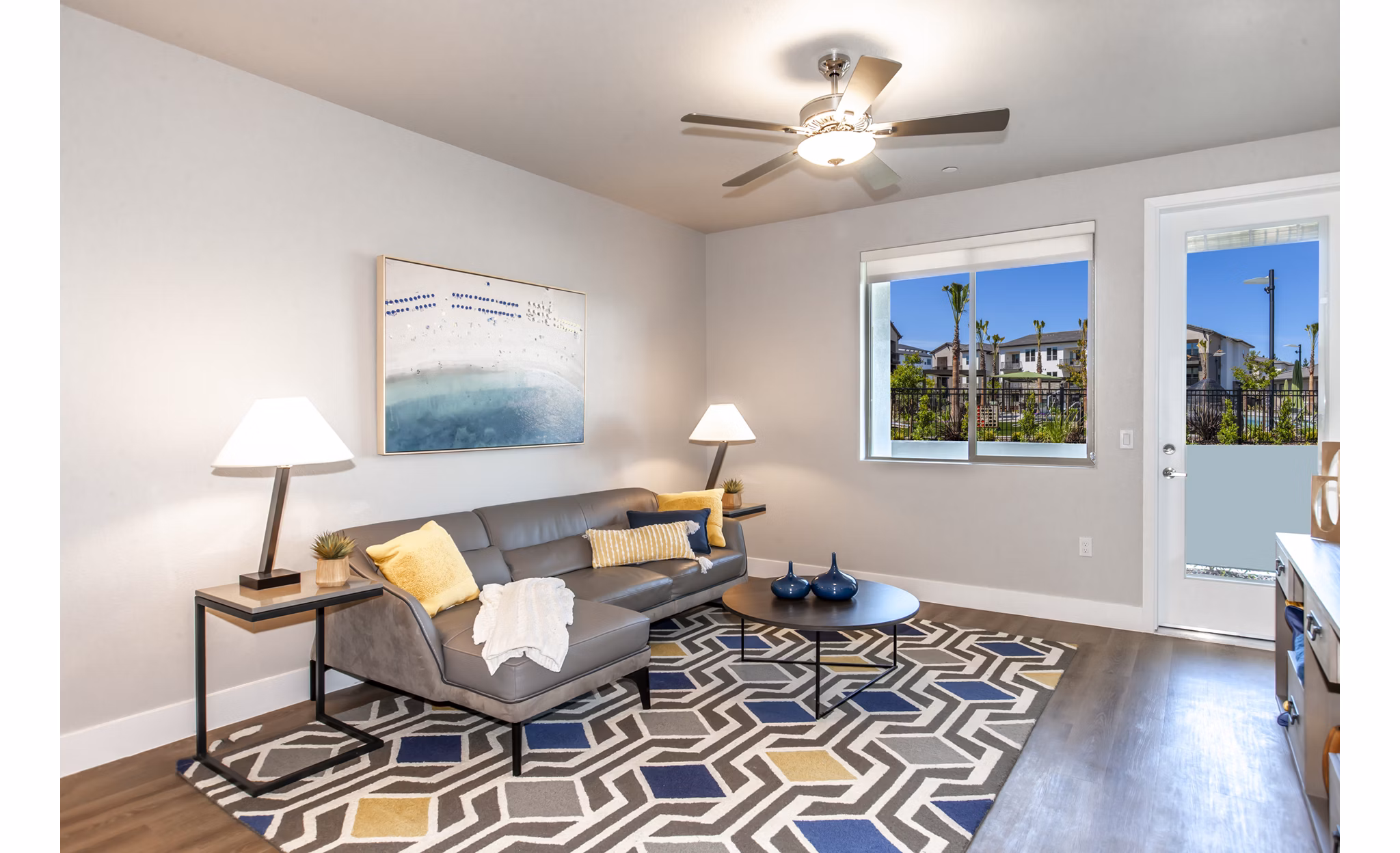 Cozy living room with sleek modern dÃ©cor in Adega Apartments, perfect for relaxation and socializing in a stylish setting