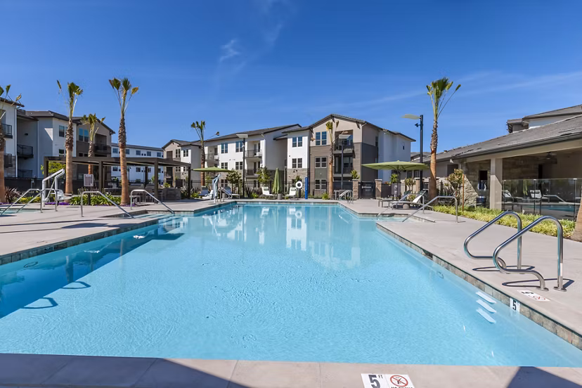 Rooftop infinity pool with panoramic views at Adega Apartments