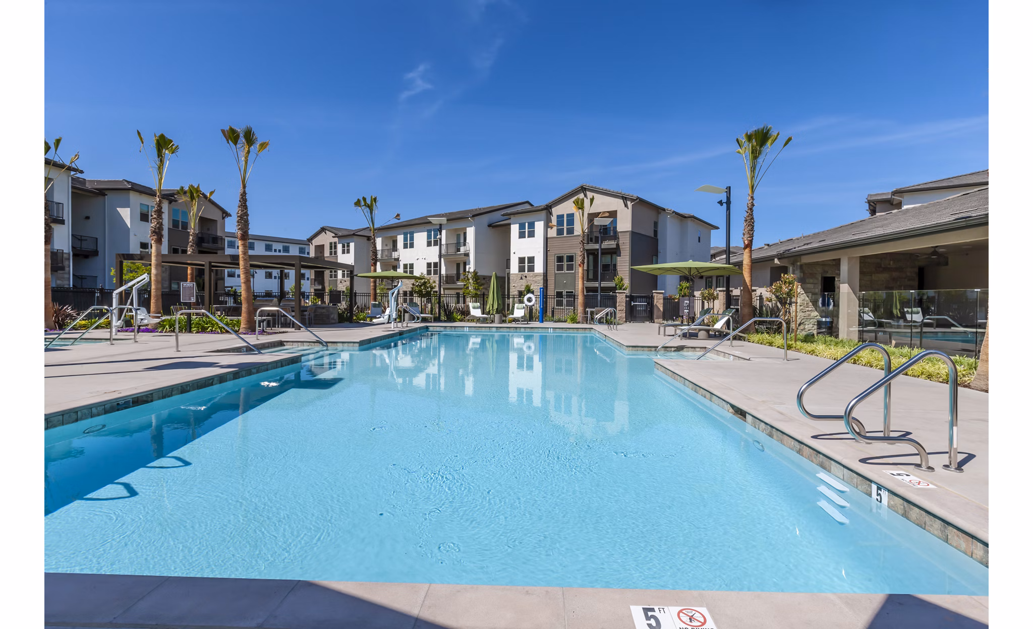 Rooftop infinity pool with panoramic views at Adega Apartments