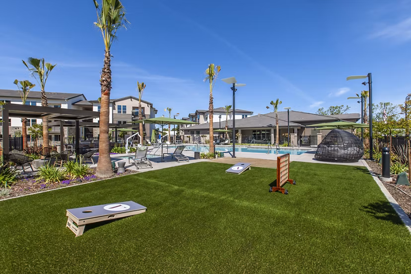 Modern sport court at Adega Apartments offering athletic facilities for residents