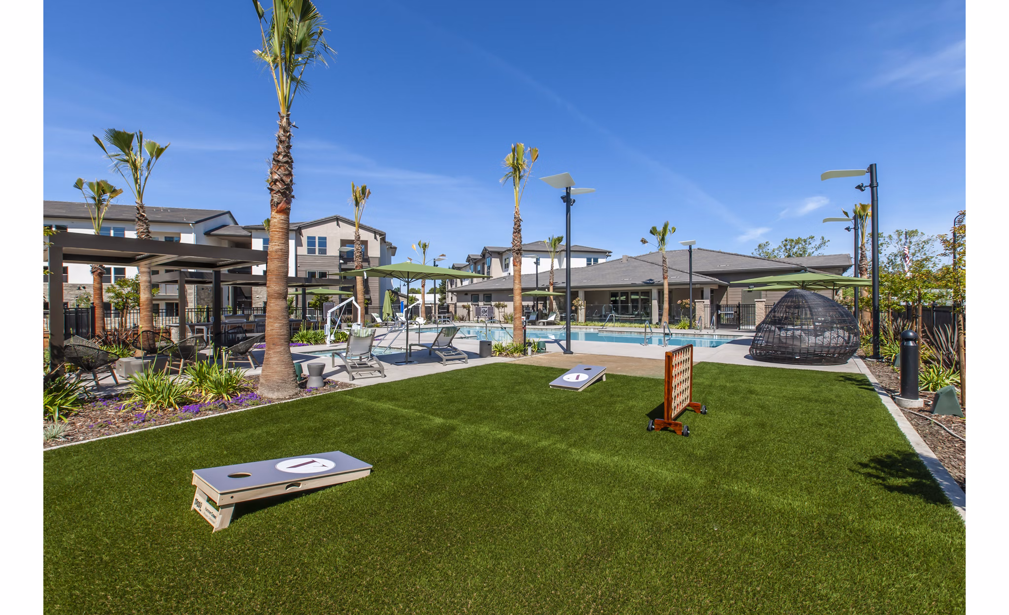 Modern sport court at Adega Apartments offering athletic facilities for residents