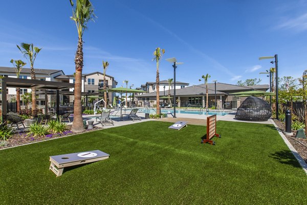 Modern sport court at Adega Apartments offering athletic facilities for residents