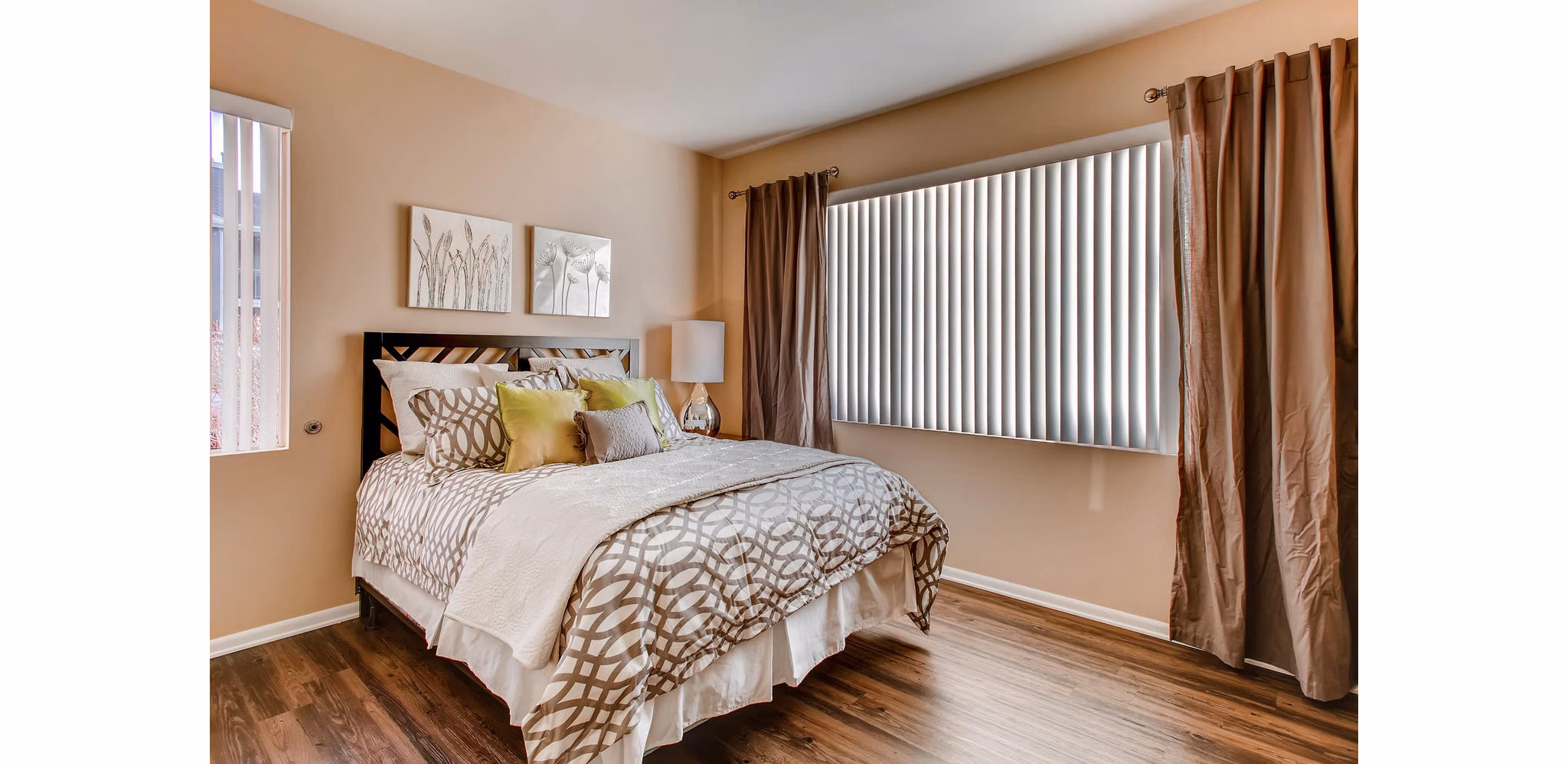 Cozy bedroom with modern decor at Mountain Gate Apartments, a serene setting in the luxury Greystar apartments portfolio