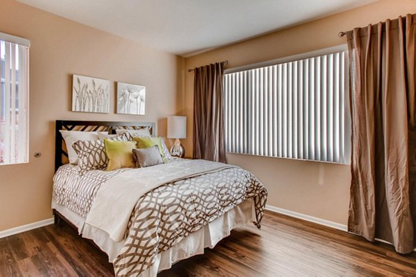 Cozy bedroom with modern decor at Mountain Gate Apartments, a serene setting in the luxury Greystar apartments portfolio