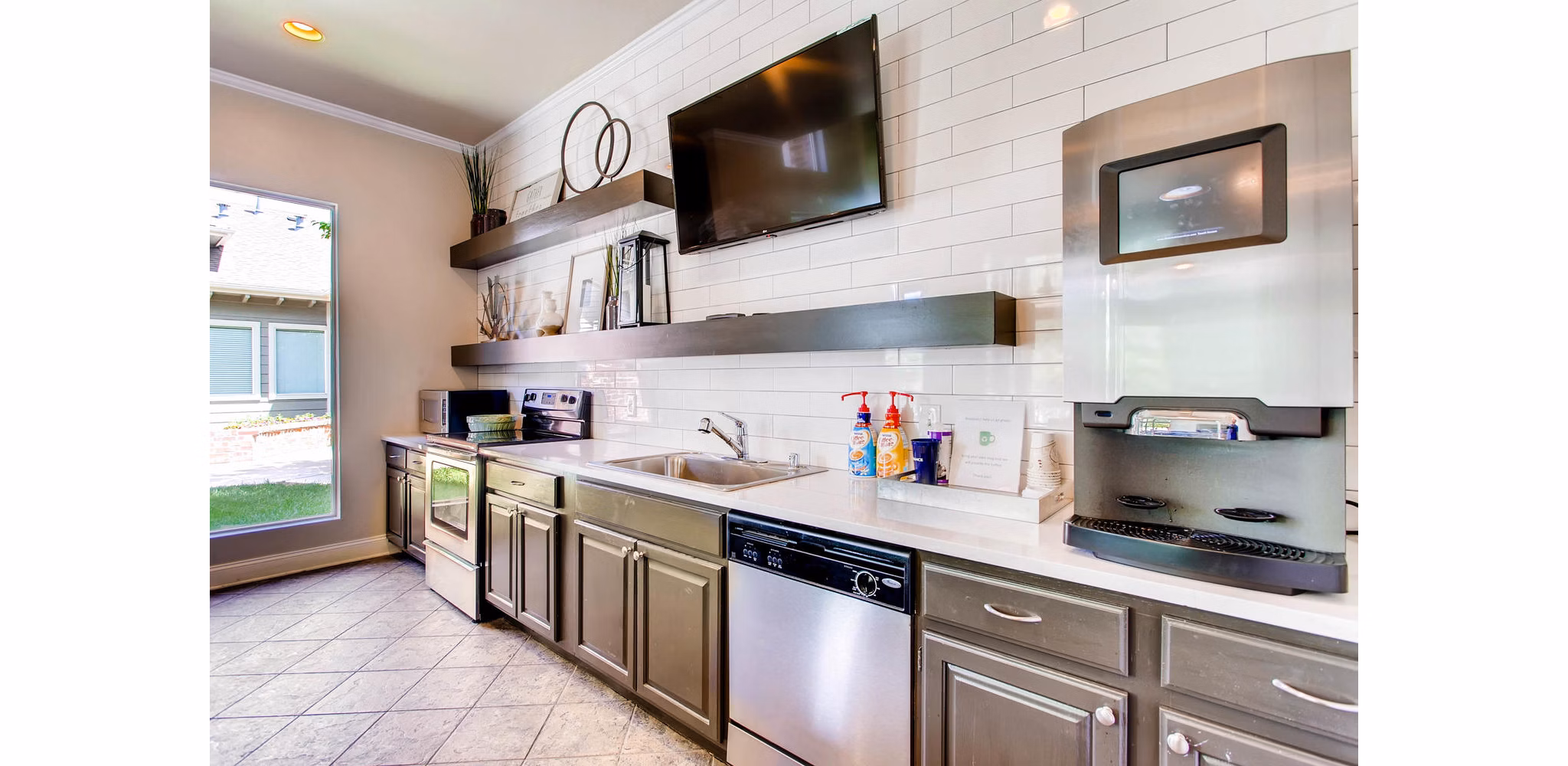 Clubhouse featuring a modern lounge and fireplace at Mountain Gate Apartments