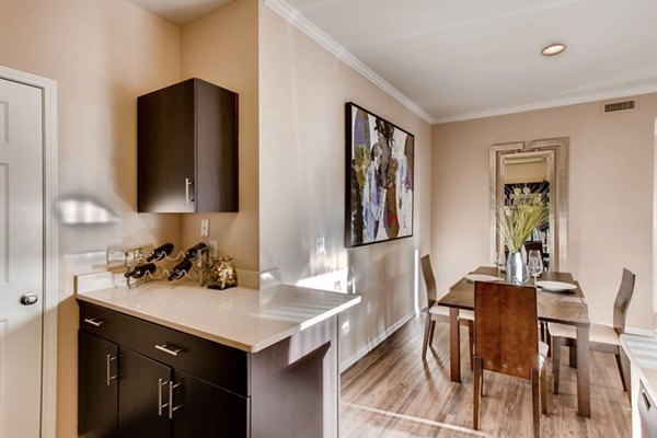 Elegant dining room with contemporary furniture in Mountain Gate Apartments, a Greystar luxury complex