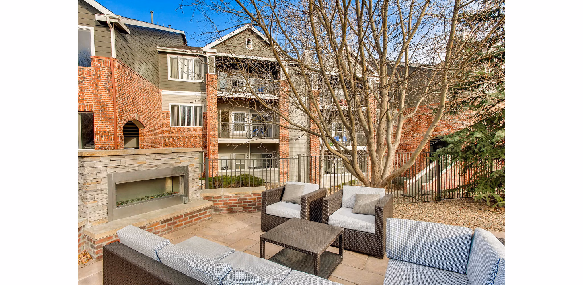 Patio with stylish outdoor seating at Mountain Gate Apartments
