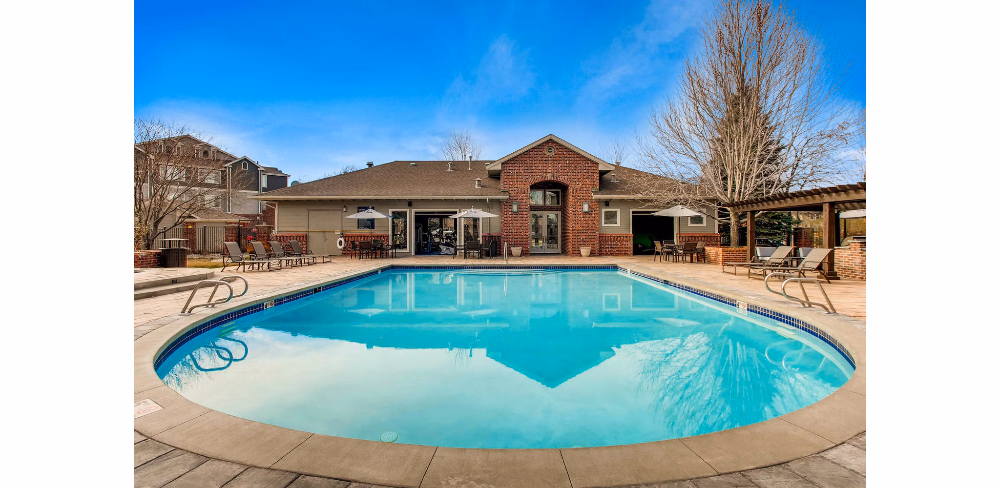 Resort-style pool at Mountain Gate Apartments offering scenic mountain views