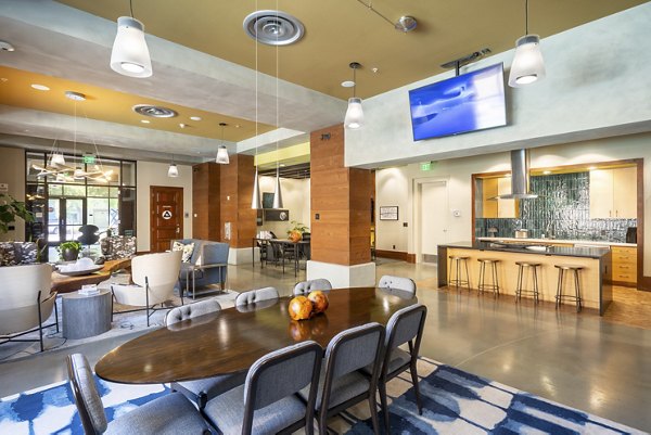 Modern clubhouse with elegant seating and decor at LINQ Midtown Apartments