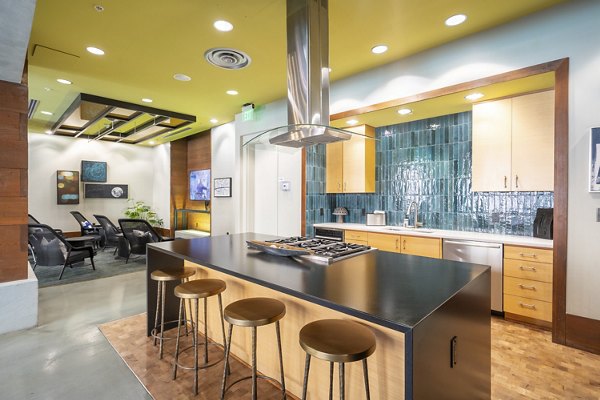 Stylish clubhouse with pool table at LINQ Midtown Apartments offering a luxurious social space