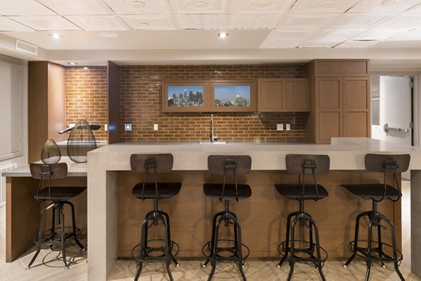 Contemporary clubhouse featuring modern decor and seating at Garey Building Apartments in downtown Los Angeles