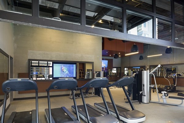 State-of-the-art fitness center with modern equipment at Garey Building Apartments