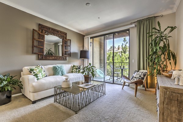 Spacious living room with modern decor at Jefferson at Carmel Mountain Ranch Apartments