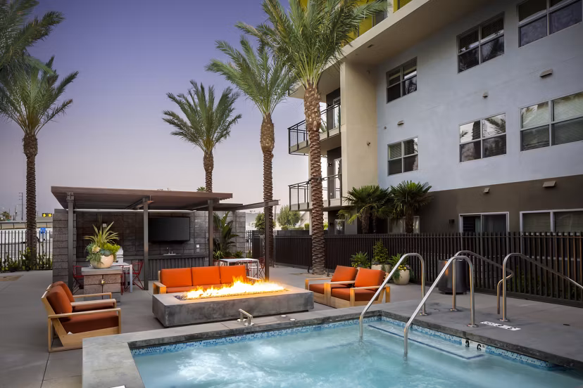 Infinity pool with scenic views at Aspect Apartments offering luxurious leisure experience for residents