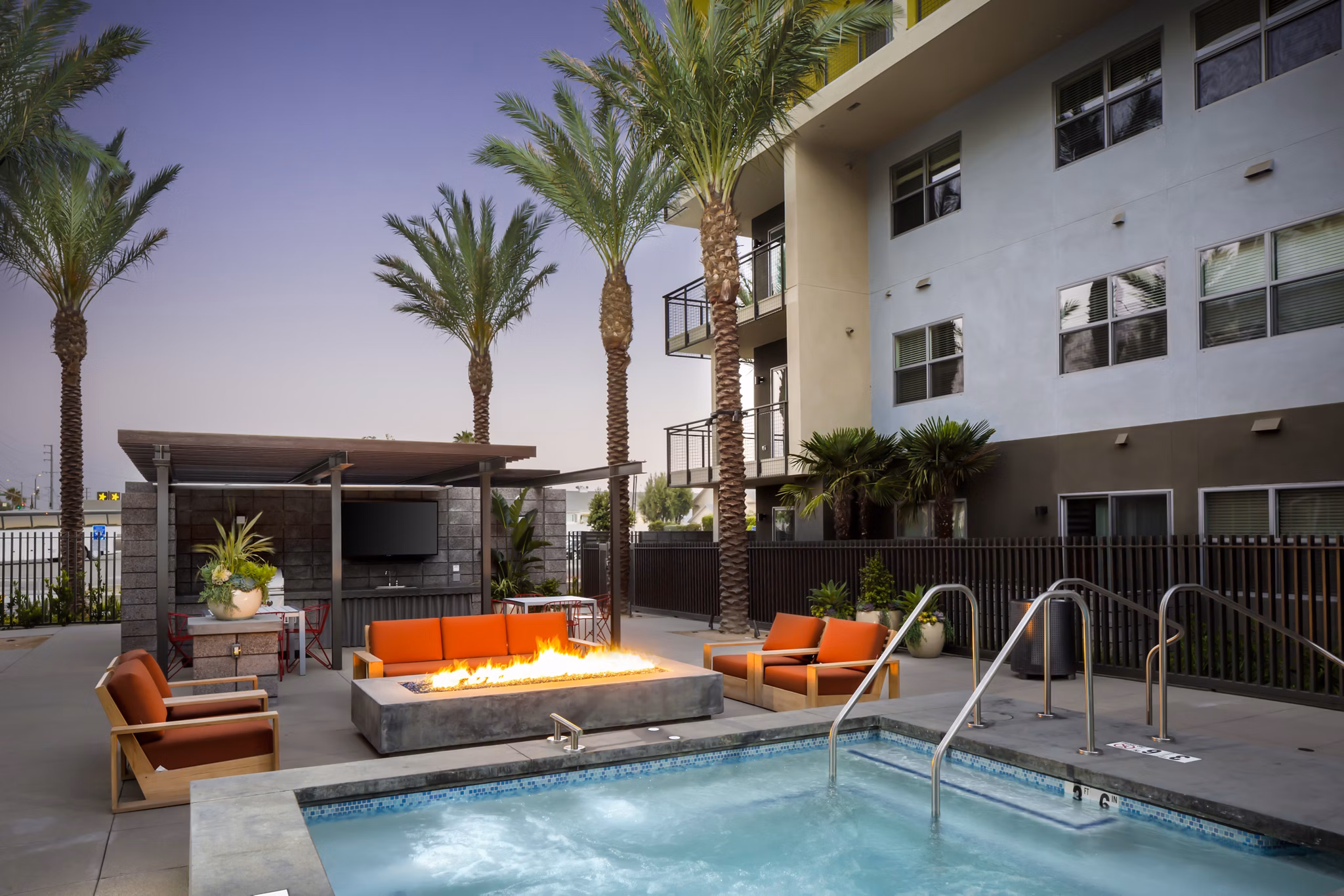Infinity pool with scenic views at Aspect Apartments offering luxurious leisure experience for residents
