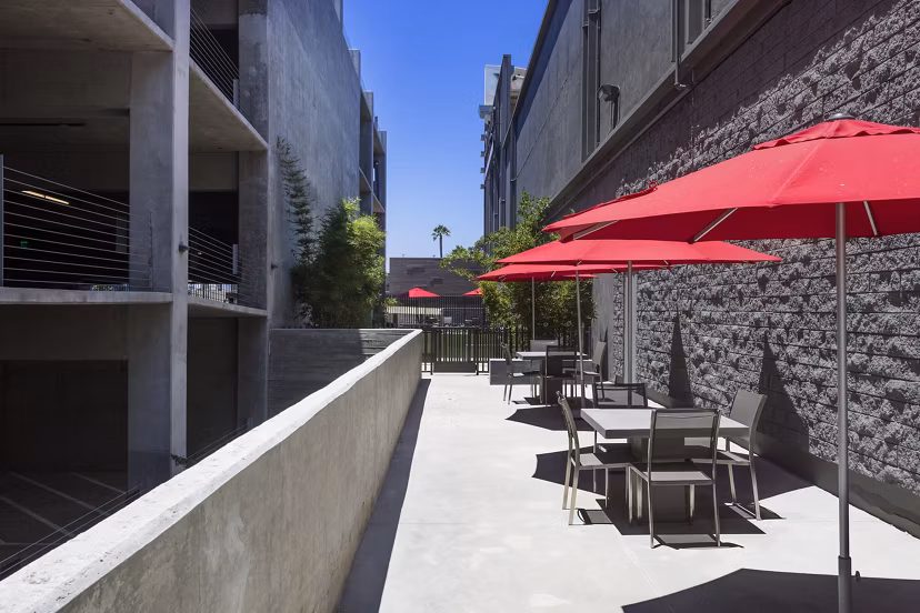 Cozy patio with outdoor seating at Aspect Apartments, ideal for relaxation and social gatherings