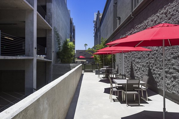 Cozy patio with outdoor seating at Aspect Apartments, ideal for relaxation and social gatherings