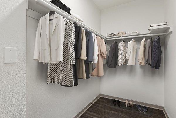 Walk-in closet with ample shelving at San Pedro Bank Lofts luxury apartments