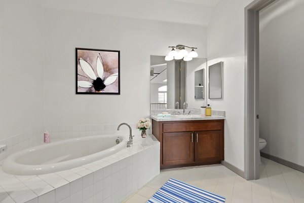 Bathroom featuring modern fixtures and sleek design at San Pedro Bank Lofts luxury apartments