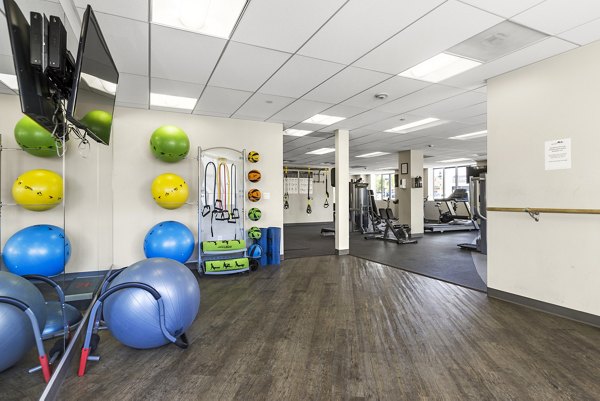 Modern fitness center with state-of-the-art equipment at San Pedro Bank Lofts luxury apartments