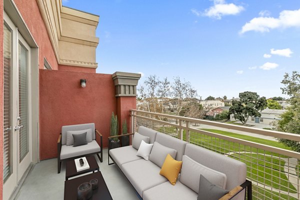 Spacious patio with modern furnishings at San Pedro Bank Lofts apartments