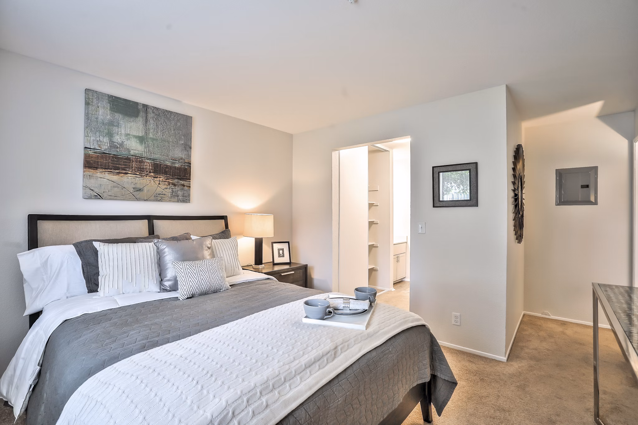 Cozy bedroom with modern decor at Alvista at the Bridge Apartments